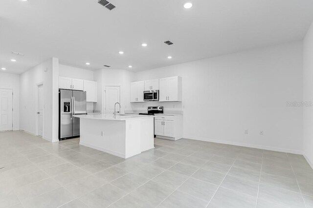 176 River Front Way, Edgewater, FL 32141 - kitchen with light countertops, stainless steel appliances, recessed lighting, and visible vents