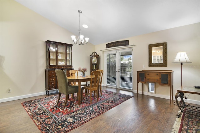 1034 Weathered Wood Cir, Winter Springs, FL 32708 - dining area with a chandelier, lofted ceiling, wood finished floors, and baseboards