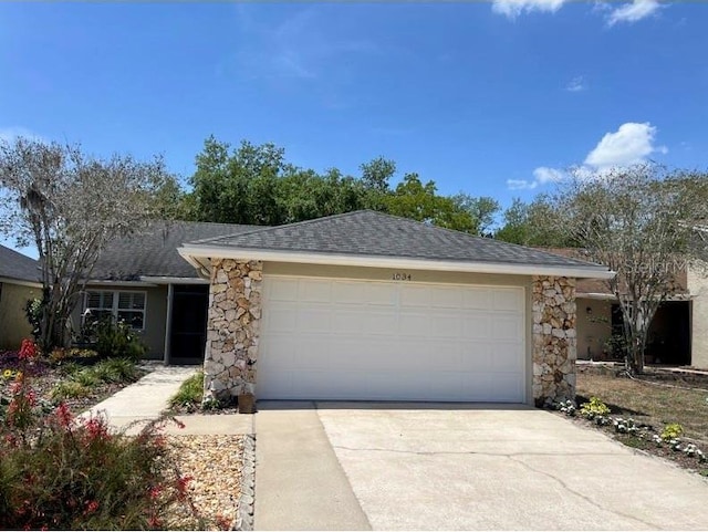 1034 Weathered Wood Cir, Winter Springs, FL 32708 - single story home featuring stone siding, an attached garage, driveway, and a shingled roof