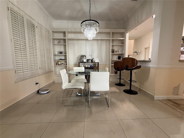 14326 Mandolin Dr, Orlando, FL 32837 - dining area featuring a chandelier, tile patterned flooring, a textured ceiling, and crown molding
