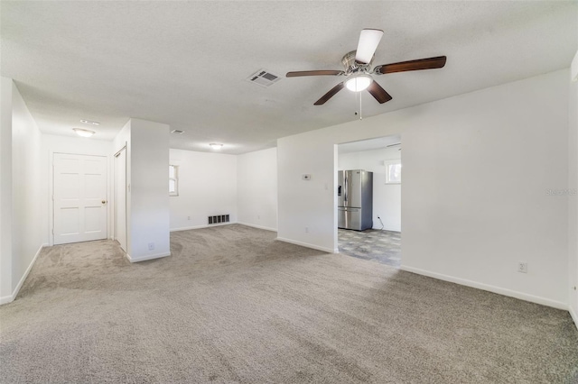 5144 Orange Ave, Winter Park, FL 32792 - carpeted spare room featuring baseboards, a ceiling fan, and visible vents
