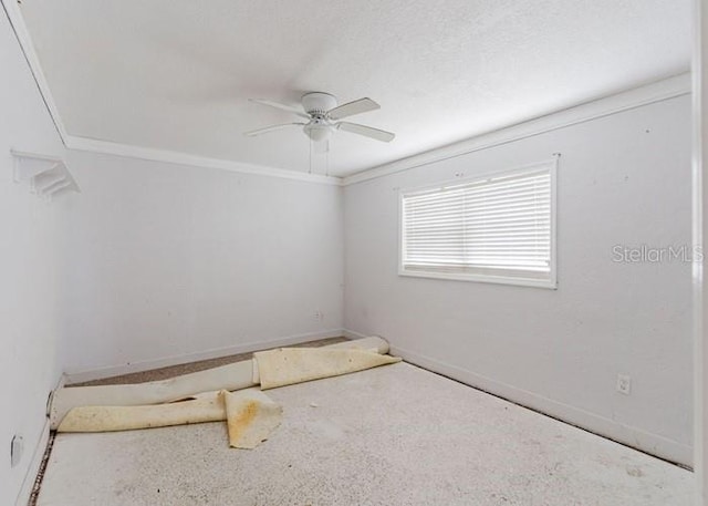 11120 5th St E, Treasure Island, FL 33706 - unfurnished room with ceiling fan, baseboards, and ornamental molding
