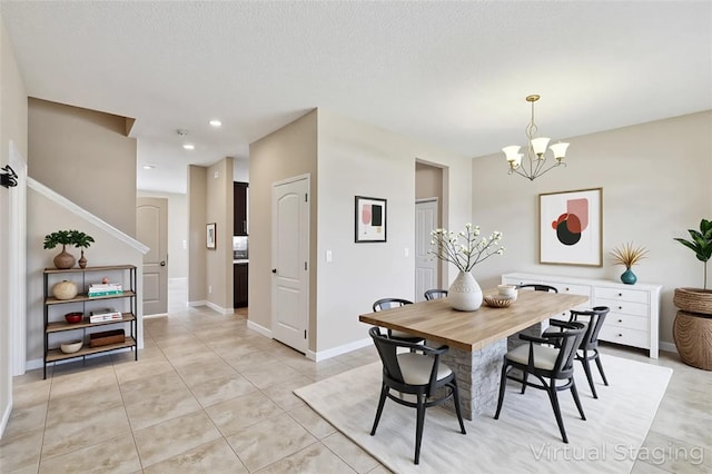 1028 Sadie Ridge Rd, Clermont, FL 34715 - dining area with a chandelier, light tile patterned floors, recessed lighting, and baseboards