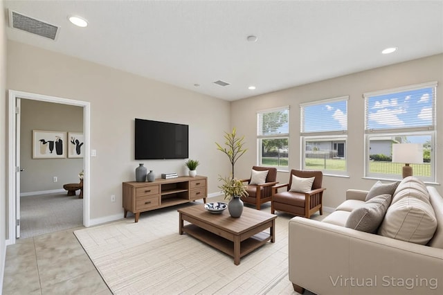 1028 Sadie Ridge Rd, Clermont, FL 34715 - living room with recessed lighting, baseboards, light colored carpet, and light tile patterned floors