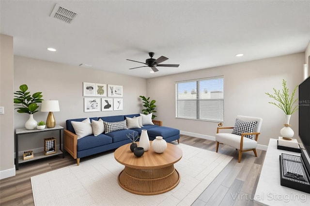 1028 Sadie Ridge Rd, Clermont, FL 34715 - living area featuring light wood-type flooring, ceiling fan, baseboards, and recessed lighting