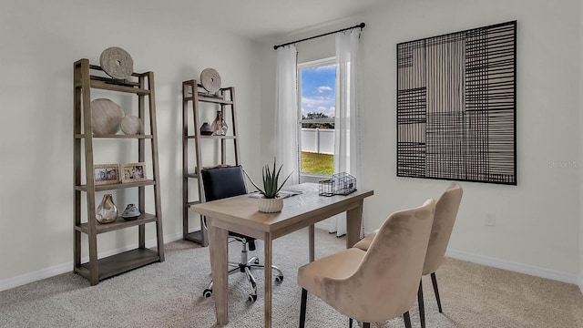 33609 Seattle Slew Dr, Sorrento, FL 32776 - carpeted home office featuring baseboards