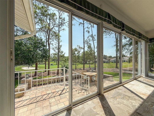 2444 Grandfather Mtn, Spring Hill, FL 34606 - entryway with plenty of natural light and stone finish floors
