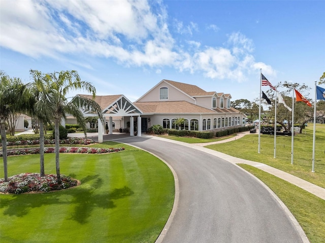 2436 Deer Trail Ln, Spring Hill, FL 34606 - view of front of home featuring a front lawn and stucco siding
