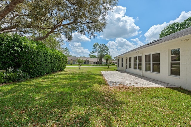 2436 Deer Trail Ln, Spring Hill, FL 34606 - view of grassy yard featuring a patio area