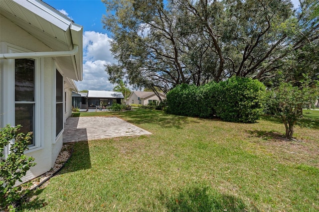 2436 Deer Trail Ln, Spring Hill, FL 34606 - view of green lawn featuring a patio