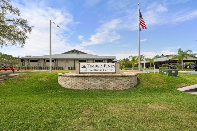 2436 Deer Trail Ln, Spring Hill, FL 34606 - surrounding community featuring a yard