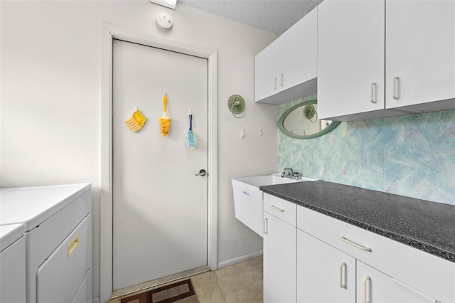 2436 Deer Trail Ln, Spring Hill, FL 34606 - kitchen featuring independent washer and dryer, white cabinetry, dark countertops, backsplash, and a textured ceiling