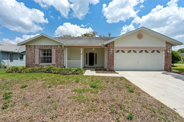 2436 Deer Trail Ln, Spring Hill, FL 34606 - ranch-style home featuring brick siding, a garage, covered porch, and driveway