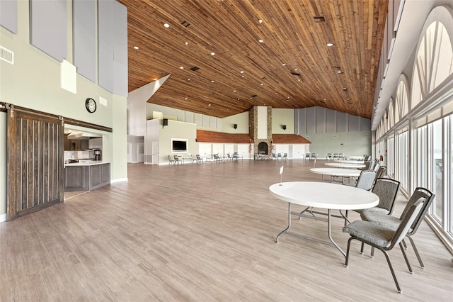 2436 Deer Trail Ln, Spring Hill, FL 34606 - common area with high vaulted ceiling and wooden ceiling