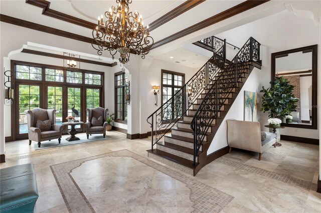 10138 Enchanted Oak Dr, Golden Oak, FL 32836 - foyer featuring stairs, baseboards, and ornamental molding