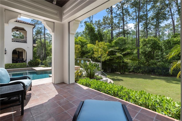 10138 Enchanted Oak Dr, Golden Oak, FL 32836 - view of patio / terrace with fence and a fenced in pool