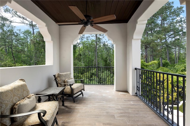 10138 Enchanted Oak Dr, Golden Oak, FL 32836 - balcony featuring a ceiling fan
