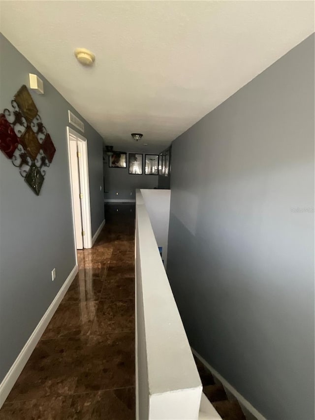2737 Merrieweather Ln, Kissimmee, FL 34743 - hallway featuring baseboards