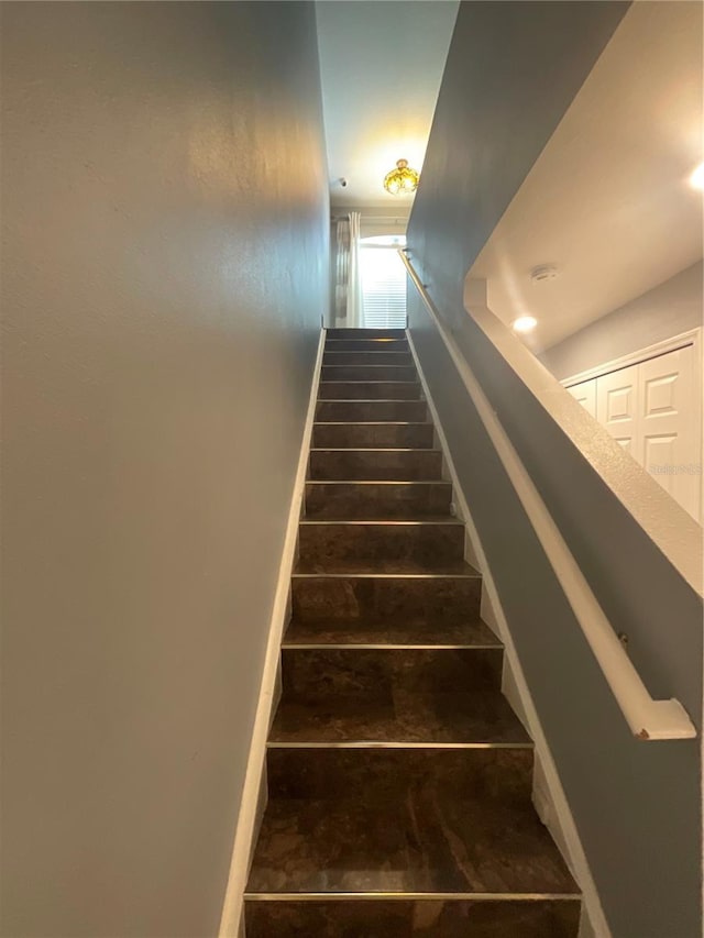 2737 Merrieweather Ln, Kissimmee, FL 34743 - stairs with baseboards
