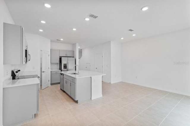 182 River Front Way, Edgewater, FL 32141 - kitchen with gray cabinetry, appliances with stainless steel finishes, recessed lighting, and visible vents