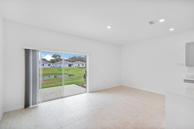182 River Front Way, Edgewater, FL 32141 - spare room featuring recessed lighting, baseboards, visible vents, and a water view