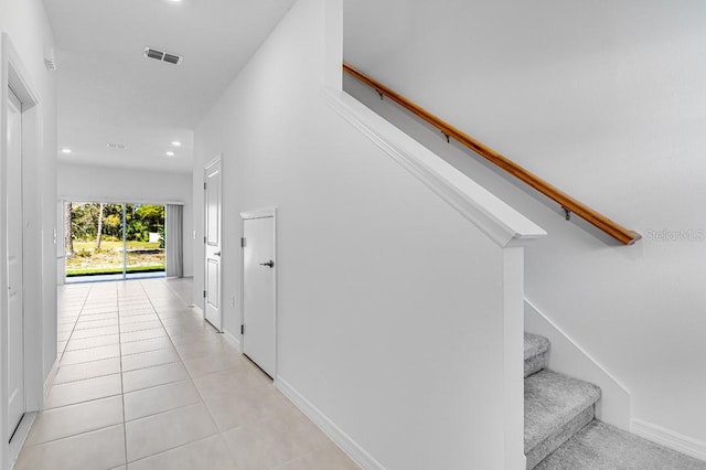 180 River Front Way, Edgewater, FL 32141 - staircase with recessed lighting, tile patterned floors, and visible vents