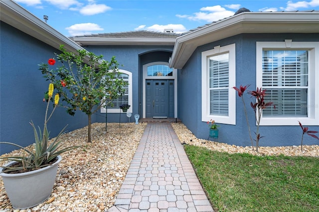 10662 Woodchase Cir, Orlando, FL 32836 - property entrance with stucco siding