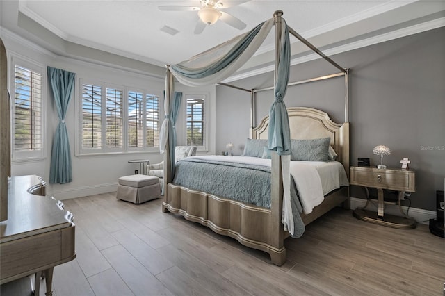 10662 Woodchase Cir, Orlando, FL 32836 - bedroom with baseboards, visible vents, ornamental molding, and wood finished floors