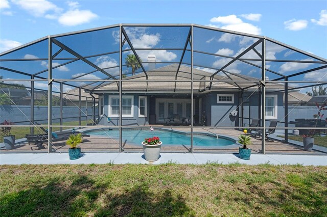 10662 Woodchase Cir, Orlando, FL 32836 - view of pool featuring a lanai, a fenced in pool, a yard, and a patio area