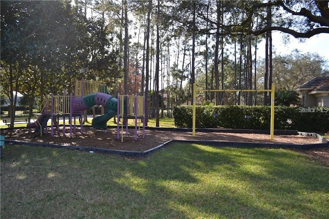 10662 Woodchase Cir, Orlando, FL 32836 - community playground featuring a lawn
