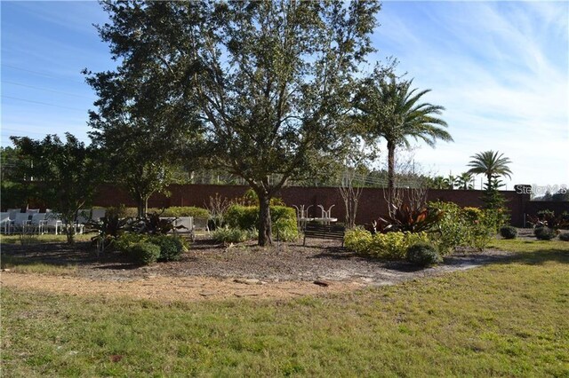 10662 Woodchase Cir, Orlando, FL 32836 - view of yard featuring fence
