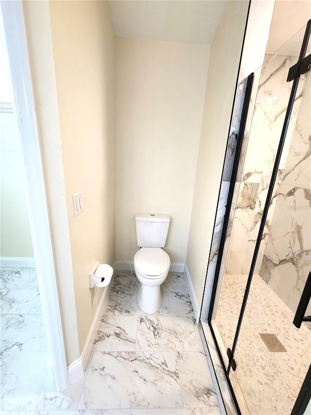 101 Dovetail Ct, Apopka, FL 32703 - full bathroom featuring marble look tile flooring, a marble finish shower, toilet, and baseboards