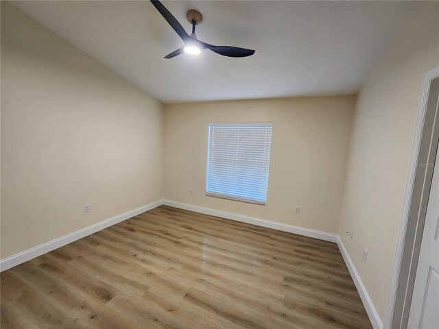 101 Dovetail Ct, Apopka, FL 32703 - spare room with a ceiling fan, wood finished floors, and baseboards
