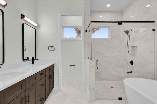 4405 Rockledge Rd, Orlando, FL 32807 - full bathroom with marble finish floor, a sink, a stall shower, and a freestanding bath