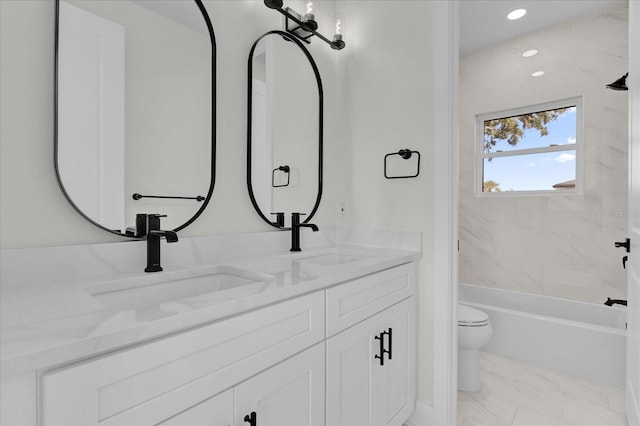 4405 Rockledge Rd, Orlando, FL 32807 - full bath with toilet, a sink, double vanity, and recessed lighting
