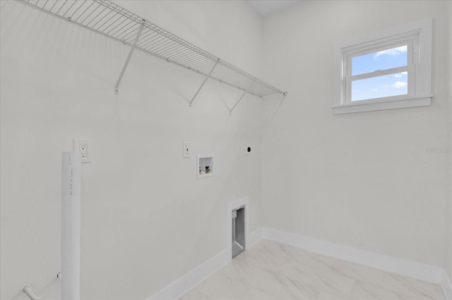 4405 Rockledge Rd, Orlando, FL 32807 - laundry area featuring washer hookup, marble finish floor, baseboards, laundry area, and electric dryer hookup