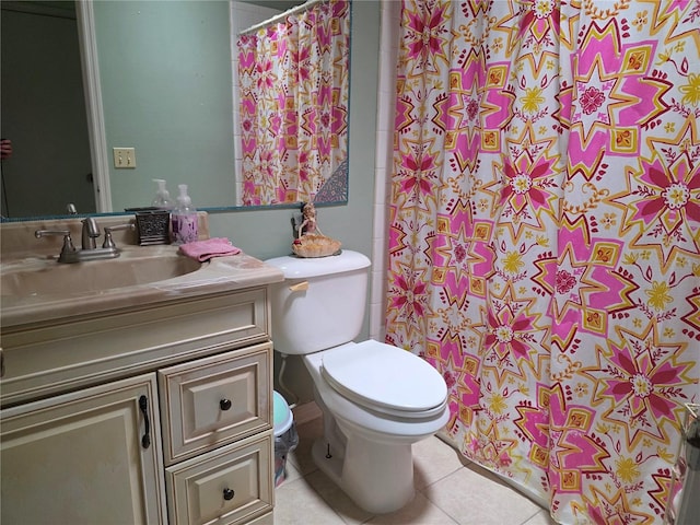 bathroom with vanity, tile patterned flooring, toilet, and a shower with curtain