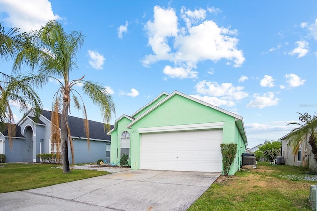 202 Aylesbury Ln, Davenport, FL 33837 - ranch-style home with a front lawn, stucco siding, central AC unit, an attached garage, and driveway