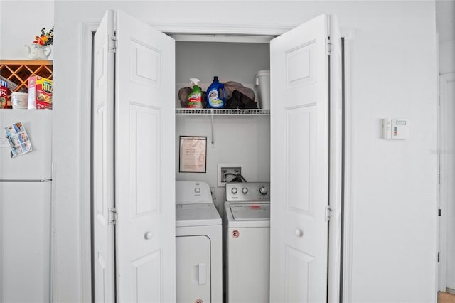 202 Aylesbury Ln, Davenport, FL 33837 - washroom with laundry area and washing machine and clothes dryer