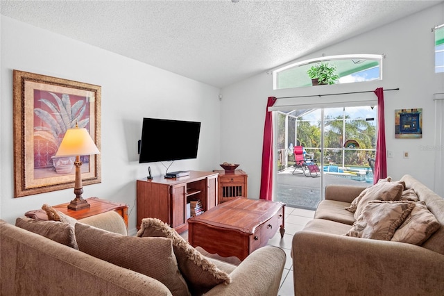 202 Aylesbury Ln, Davenport, FL 33837 - tiled living area featuring a textured ceiling and lofted ceiling
