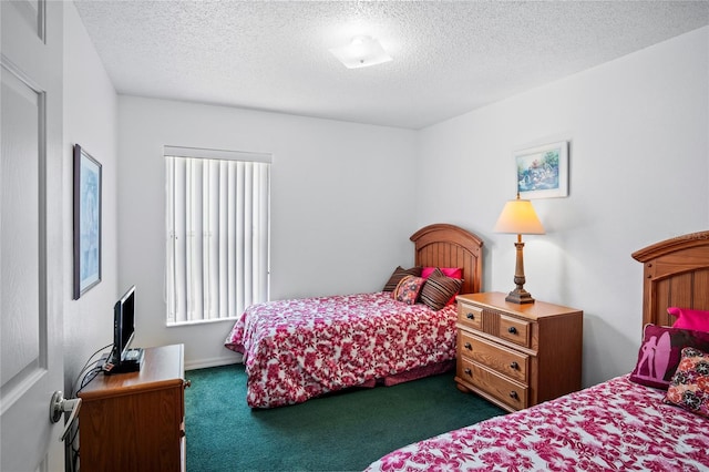 202 Aylesbury Ln, Davenport, FL 33837 - carpeted bedroom with a textured ceiling