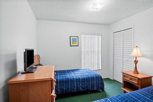 202 Aylesbury Ln, Davenport, FL 33837 - carpeted bedroom with a textured ceiling and baseboards