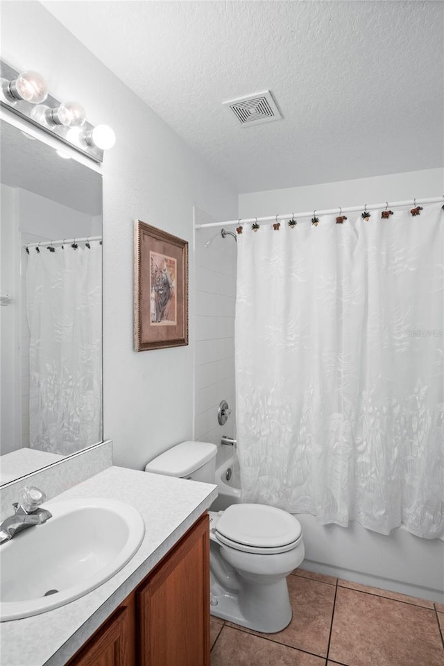 202 Aylesbury Ln, Davenport, FL 33837 - bathroom featuring visible vents, tile patterned flooring, vanity, shower / bath combination with curtain, and toilet