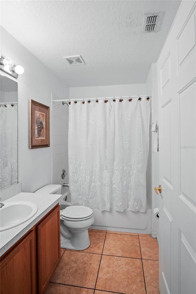 202 Aylesbury Ln, Davenport, FL 33837 - bathroom featuring vanity, a textured ceiling, and visible vents