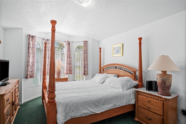 202 Aylesbury Ln, Davenport, FL 33837 - bedroom featuring baseboards, vaulted ceiling, dark colored carpet, and a textured ceiling
