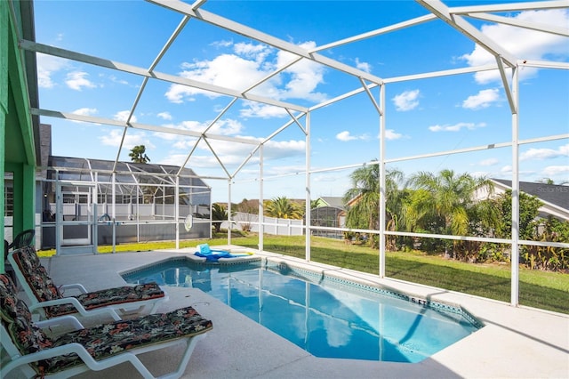 202 Aylesbury Ln, Davenport, FL 33837 - view of pool with a patio area, a hot tub, glass enclosure, a fenced in pool, and a yard