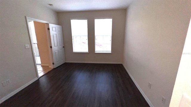 11446 Jasper Kay Ter Unit 202, Windermere, FL 34786 - unfurnished room with wood finished floors and baseboards