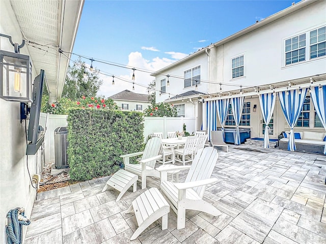 2240 Osprey Ave, Orlando, FL 32814 - fenced backyard with a patio area and outdoor dining space