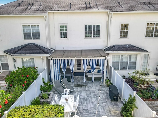 2240 Osprey Ave, Orlando, FL 32814 - back of house with a patio area, a fenced backyard, and stucco siding