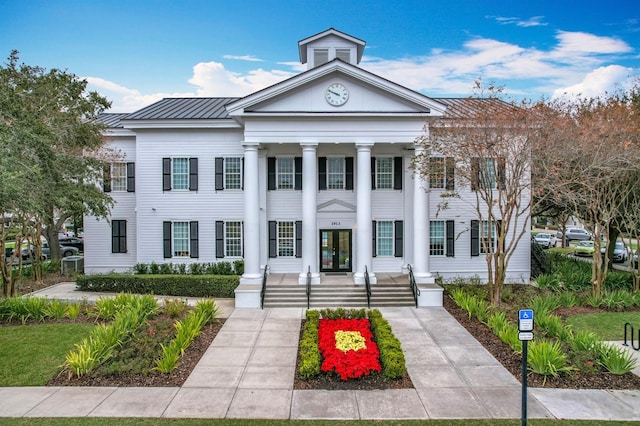 2240 Osprey Ave, Orlando, FL 32814 - view of front facade featuring a metal roof, covered porch, and french doors